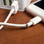 Broken charger cable with smart phone